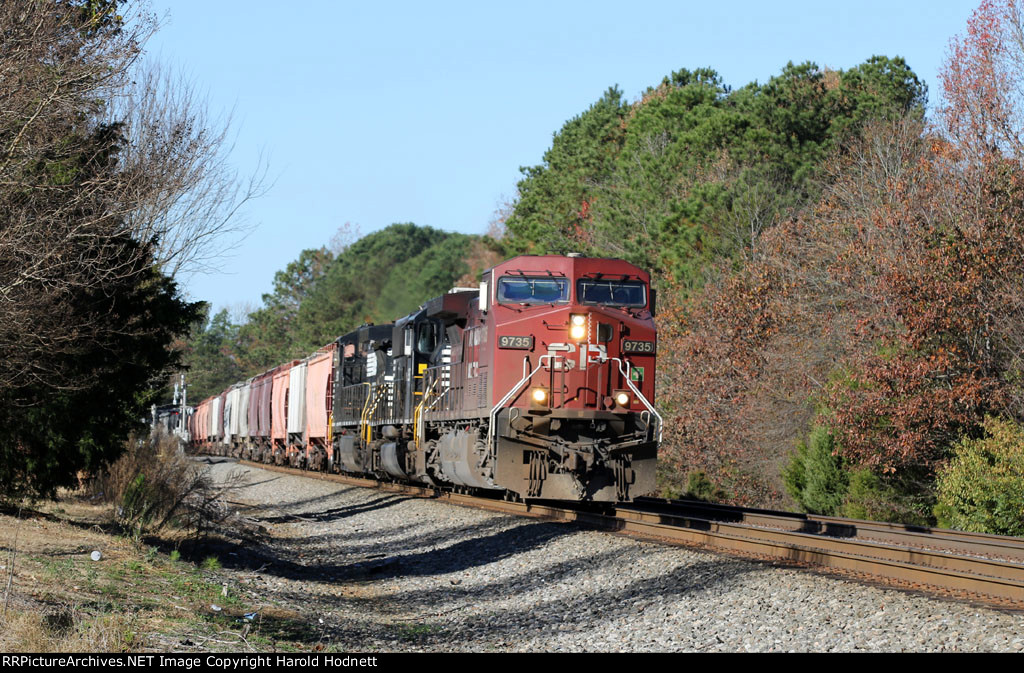 CP 9735 leads NS train 61U eastbound